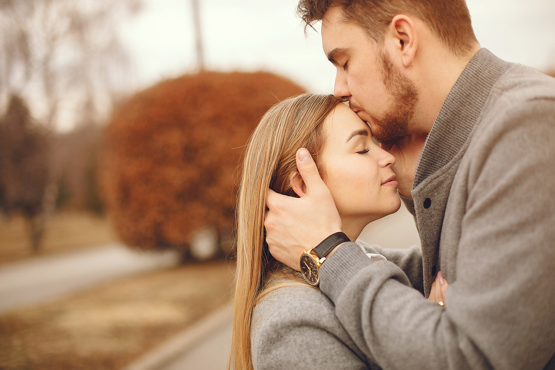 Loving couple kissing in park